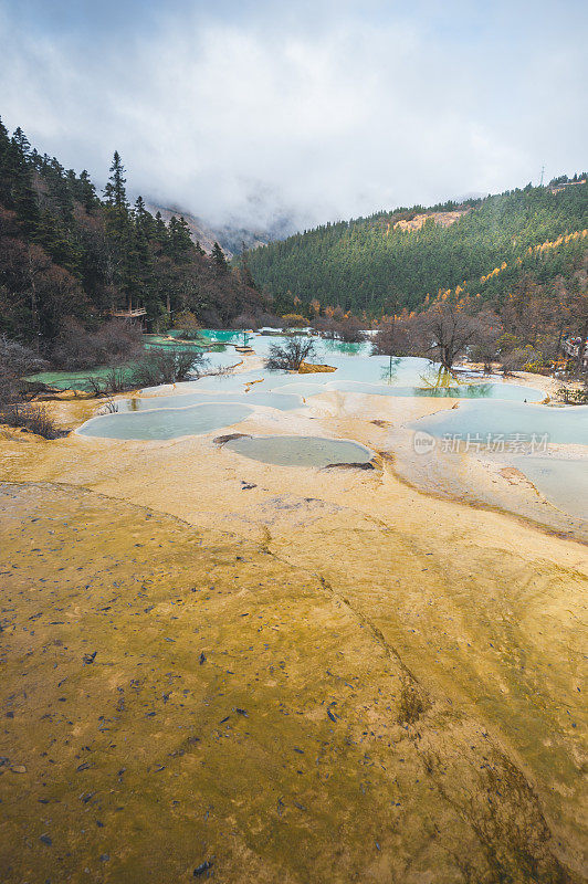 Beautiful nature landscape of Huang Long and Jiuzhaigou Park National Park with amazing snow in Sichuan , China